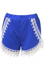 short blue shorts with while lace trimmings.